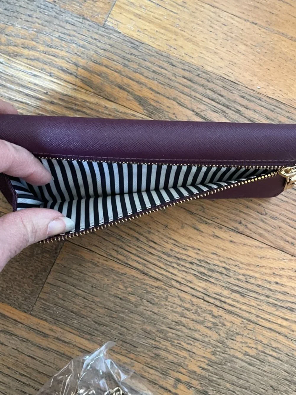 Kate Spade Large bi- Fold wallet in Deep Plum